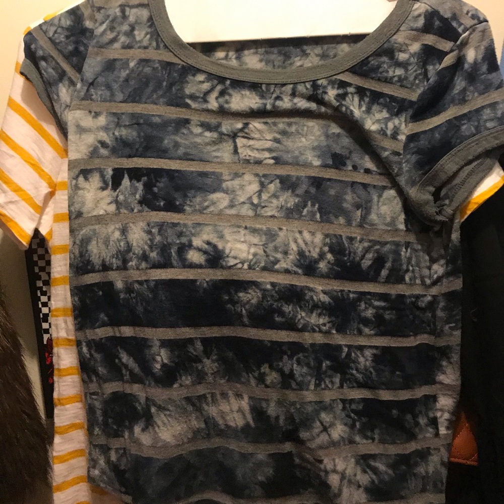 A navy blue and grey tie dye shirt